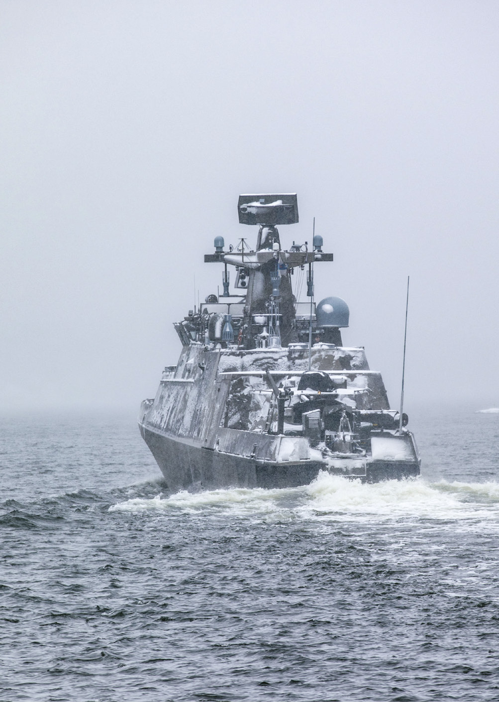 A large boat is traveling on the water, with a group of people on board.

AI generated content